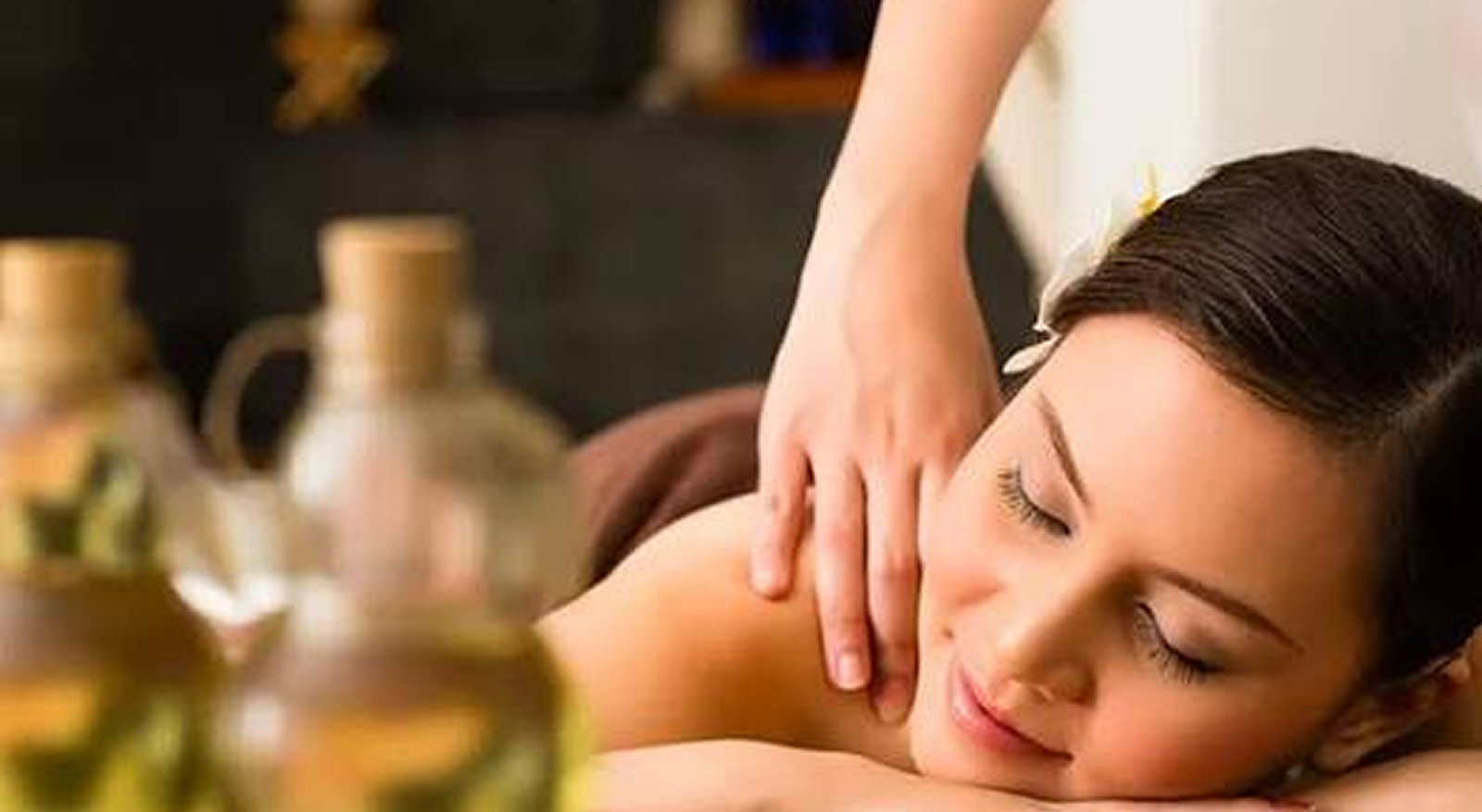 Guest receiving a shoulder massage at the spa